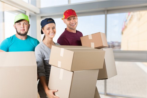 Professional moving team planning a removal van job in Merton