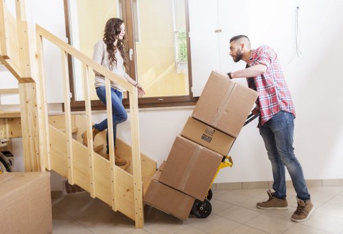Local removal company in Merton transporting furniture