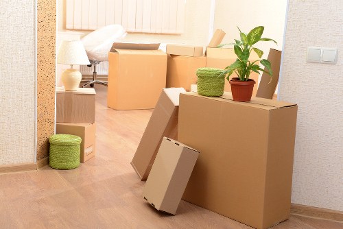 Packing materials and labeled boxes for a move in Merton