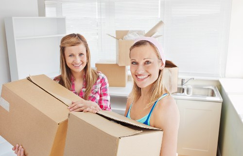 Packed moving boxes ready for house removals in Merton