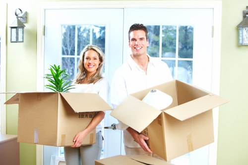 Professional home moving team planning access in Merton