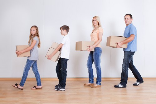 Packed household boxes ready for a move in Merton