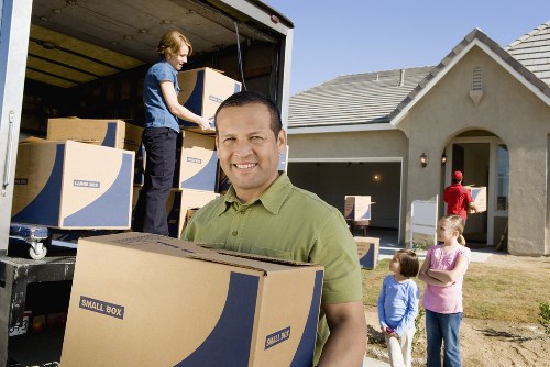 Cardboard and household items prepared for recycling and donation